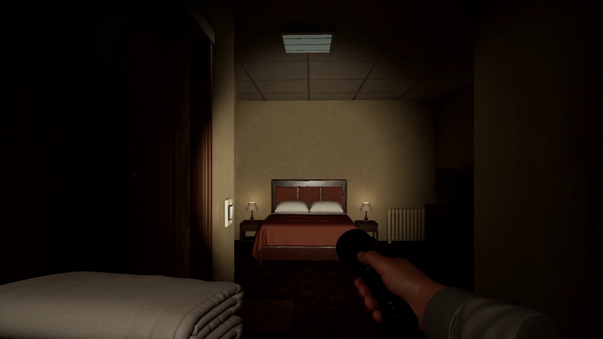 Dark guest room bedroom with bed and bedside lamps
